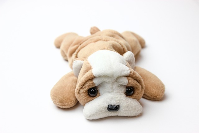 Peluche perro online acostado